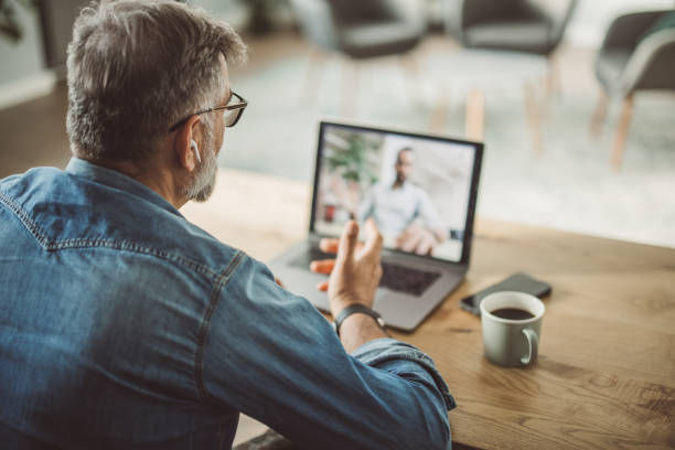 istock Mature man working from home office 1395133317