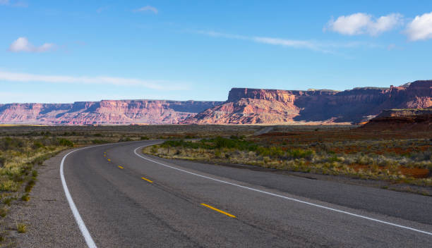 istock A highway goes to the mountain. 1395142130