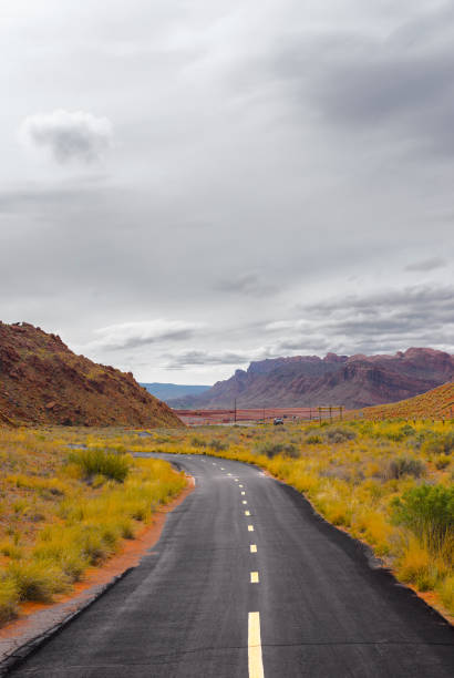 istock A highway goes to the mountain. 1395142486
