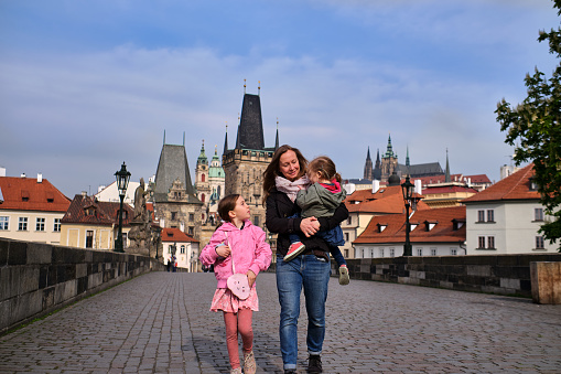 Come along and see what is to be an authentic tourist in the historical city of Prague. Taken from Charles bridge towards Mala strana.