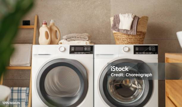 Interior Of A Real Laundry Room Stock Photo - Download Image Now - Washing Machine, Dryer, Laundry