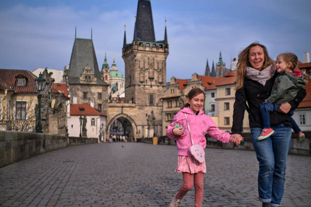 istock Prague vacation experience - walk over Charles bridge 1395146537