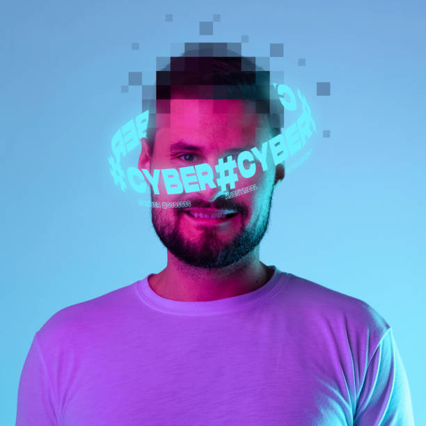 istock Contemporay artwork. Young man with pixel head elements and neon lettering around isolated over blue background in neon light 1395151068