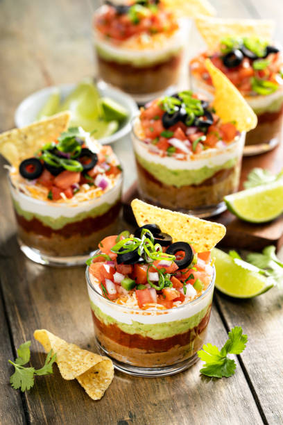 istock Seven layer dip in individual cups, mexican appetizer 1395153612