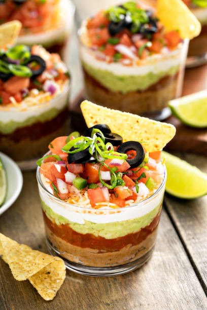 istock Seven layer dip in individual cups, mexican appetizer 1395154230