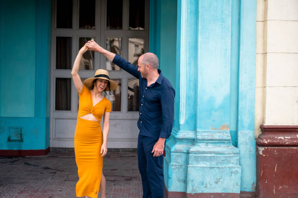 Tourist couple dancing in Old Havana Travellers in Havana, Cuba. Things to do in Havana. Cuban culture and travel. cuba travel stock pictures, royalty-free photos & images