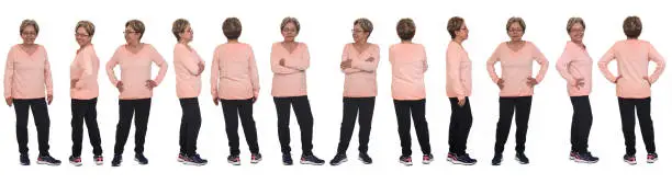 large group of same senior woman with sportswear on white background