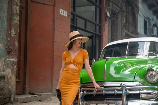 Tourist in Havana. Classic cars and Cuban Culture on the streets of Old Havana.
