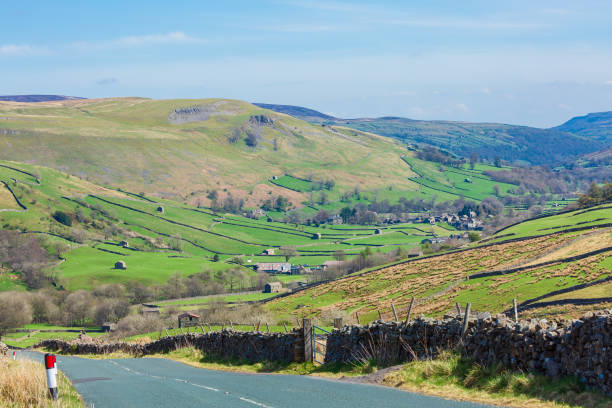 istock Buttertubs Pass in Springtime.  High level, dramatic road leading from Hawes and down into Thwaite, Yorkshire Dales, UK.  Horizontal.  Copy Space. 1395154880