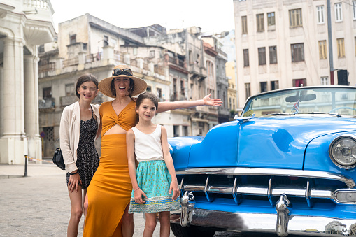 Tourists visiting Old Havana. Family travel with kids in Havana, Cuba.