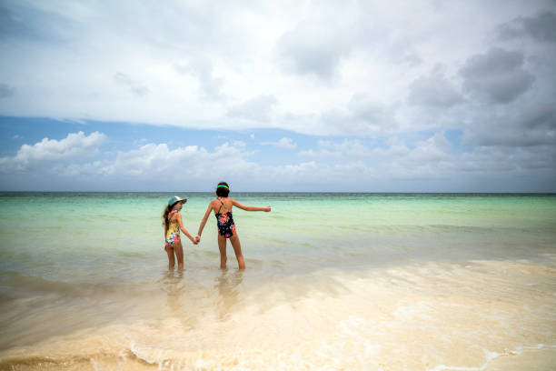 istock Kids on a tropical Caribbean vacation 1395157124