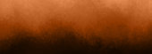 istock Dark orange red gradient art texture background abstract wavy dusty cloud or sand dunes desert in painted textured horizontal panoramic banner header backdrop design 1395160869
