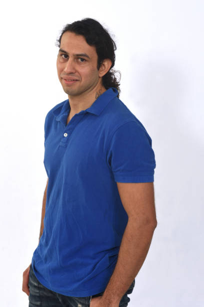portrait of a smiling man looking at camera on white background