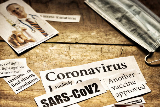 istock Newspaper clippings about the Covid-19 pandemic 1395161277