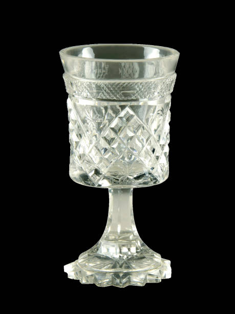istock Empty antique wine glass isolated on black 1395161928