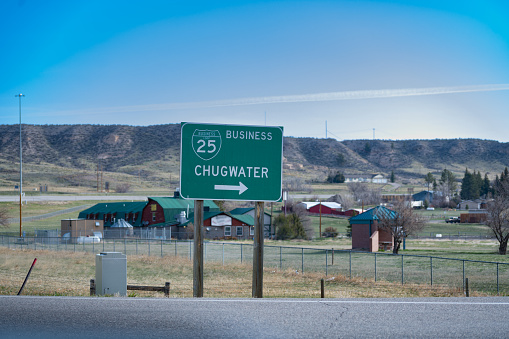 Highway sign in small Wyoming town of Chugwater in western United States of America (USA).