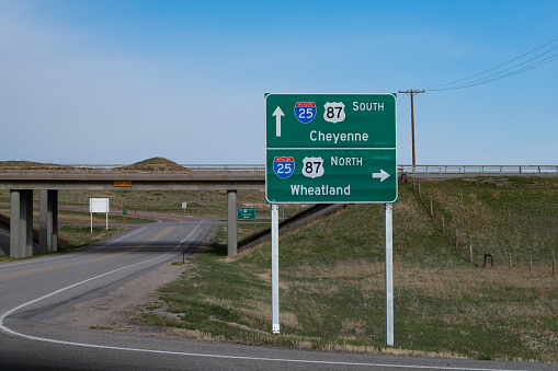 Highway sign in small Wyoming town of Chugwater in western United States of America (USA).