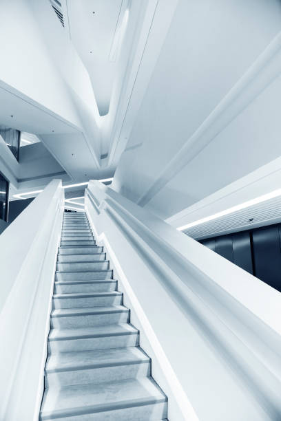 istock Interior view of empty futuristic stairway. Building abstract background 1395165363