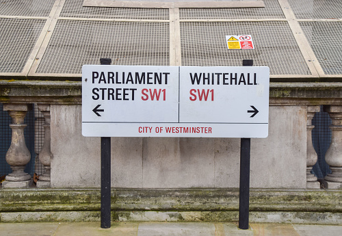 London, United Kingdom - January 24 2022: Whitehall and Parliament Street signs detail.