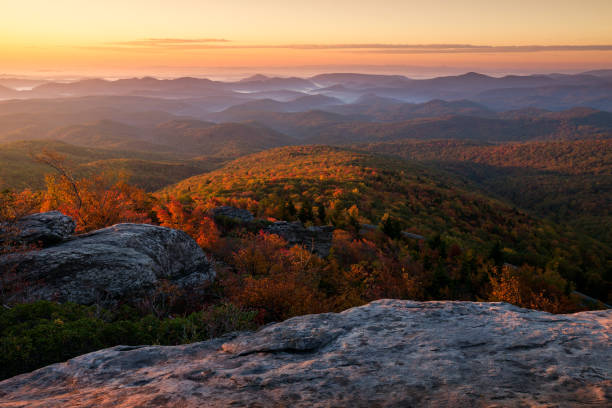 istock Morning light over autumn mountain landscape 1395165580