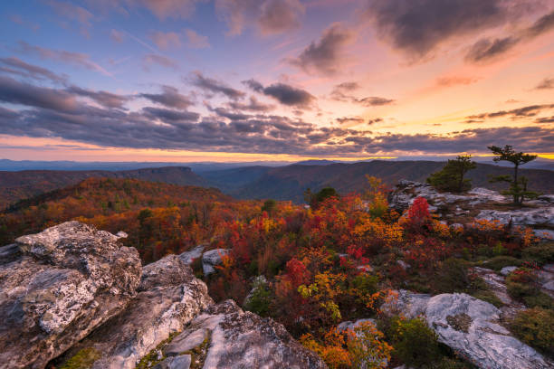 istock Autumn sunset over autumn mountain landscape 1395166394
