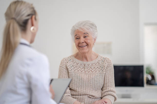 istock Senior Woman at a Check-Up 1395169338