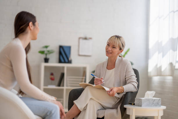 istock Distraught Woman in Therapy 1395175267