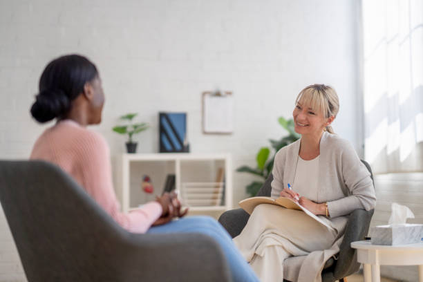 istock Young Woman in a  Counseling Session 1395175276