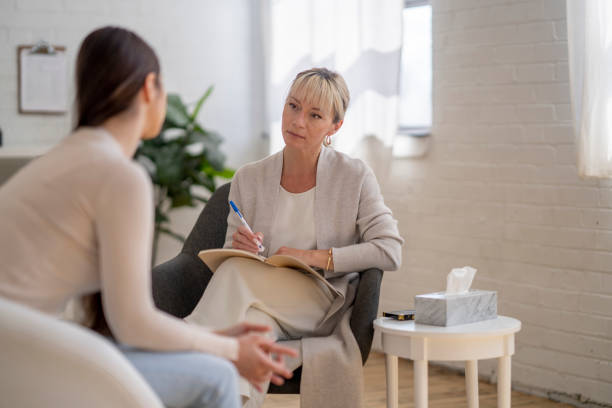 istock Distraught Woman in Therapy 1395175288