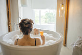 istock Relaxing sunday vibes Chilling day asian chinese beautiful woman relaxing in bathtub in summer staycation 1395176214