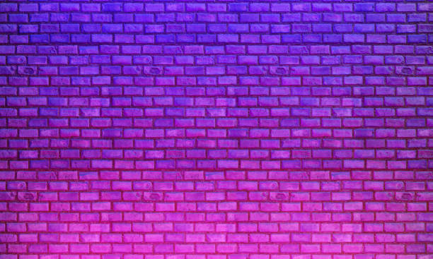 istock Neon lights on the old brick wall background 1395176657