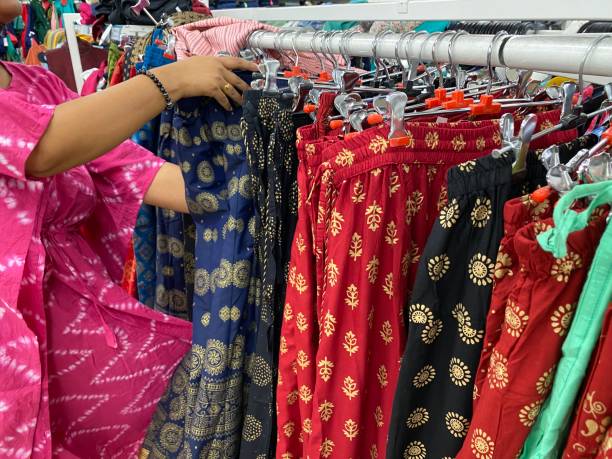 istock woman shopping in retail store 1395176836