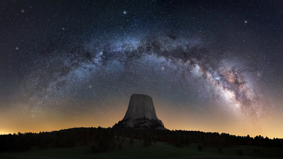 The length of the Milky way galaxy stretched out in a bow over the Devils Tower National Monument