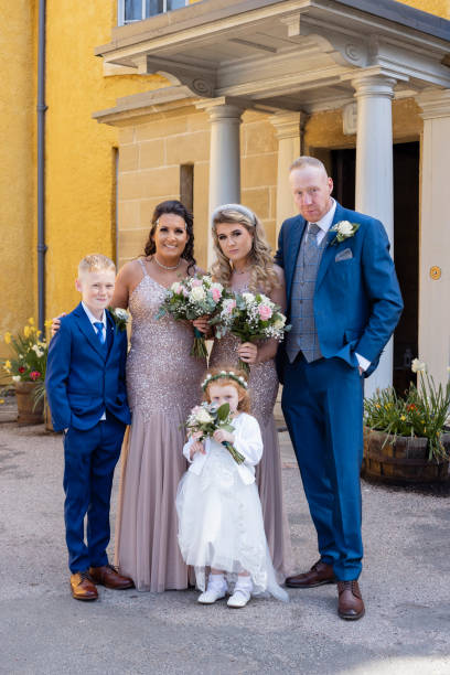 istock Bridesmaids and Wedding Guests 1395178815