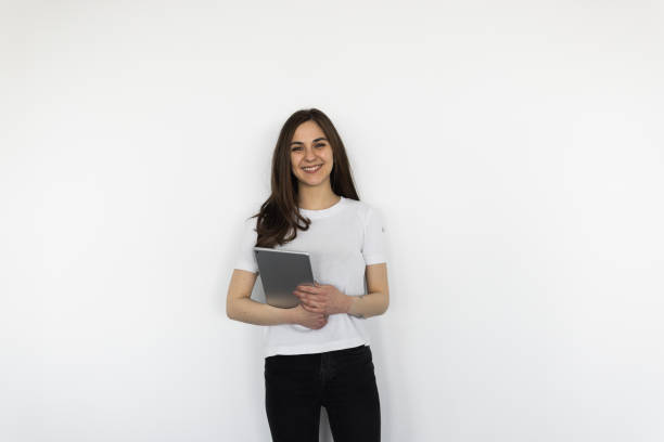 istock Young woman with a tablet 1395181904