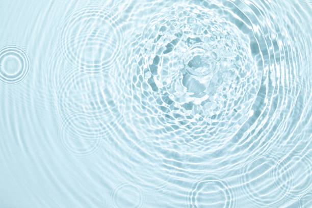istock The texture of water on a blue background. 1395184781