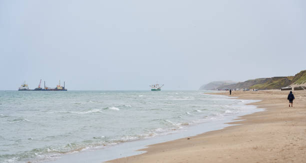 istock Scenic view of seascape against clear sky 1395185232