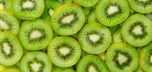 istock Kiwi Macro,kiwi beautiful background slice fruit, 1395185290