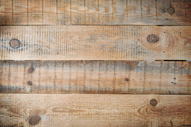 istock Wooden planks joined together with a copy space 1395185454