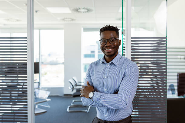 istock Black CEO in front of his office 1395189436