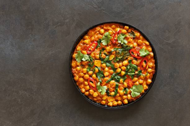 istock Spicy Chickpea and Spinach Curry. Moroccan chickpea stew. 1395196261