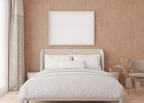 istock Empty picture frame on wooden wall in modern bedroom. Mock up interior in boho style. Free, copy space for your picture, poster. Bed, window and curtain, pampas grass, parquet floor. 3D rendering. 1395196879