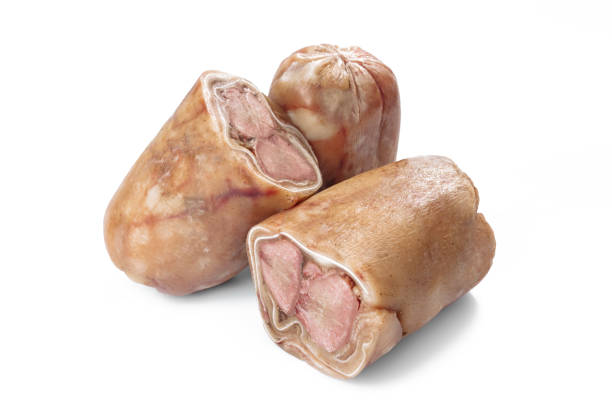 Raw pork legs on a white background