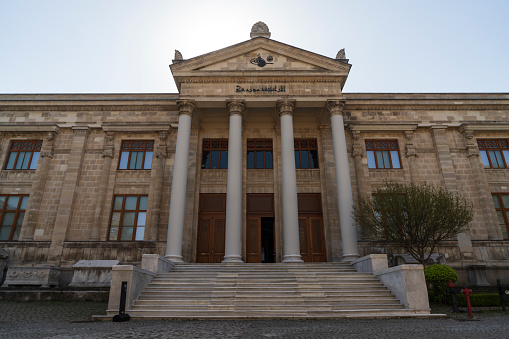 Istanbul, Turkey - April 14, 2022: Stairs and entrance with columns of Istanbul Archaeology Museum located in Sultanahmet.