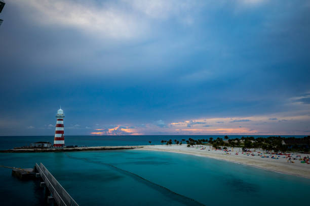istock A bay on exotic tropical island with a lighthouse on its edge 1395204392