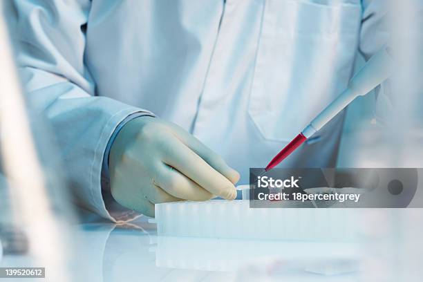 Close Up Of Scientist Using Pipette In Laboratory Stock Photo - Download Image Now - Biotechnology, Blood, Blood Collection Tube
