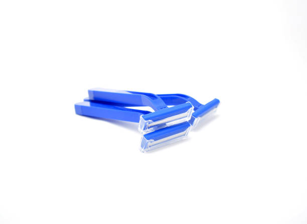 istock disposable blue shaving razor on white background 1395207491