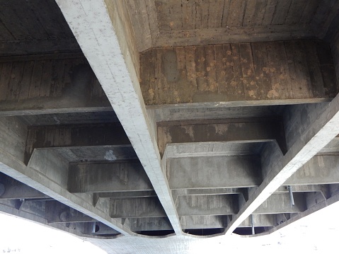 Concrete beam of bridge. Structural photos and cement beams under the bridge