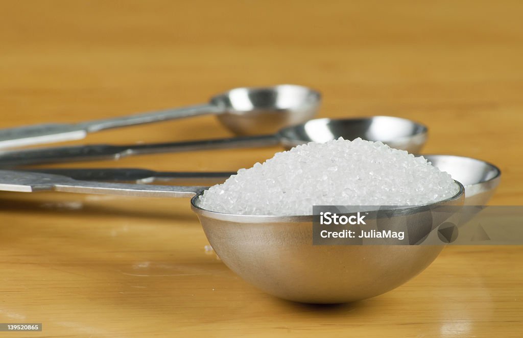 Мерная ложка полный сахара - Стоковые фото Белый роялти-фри