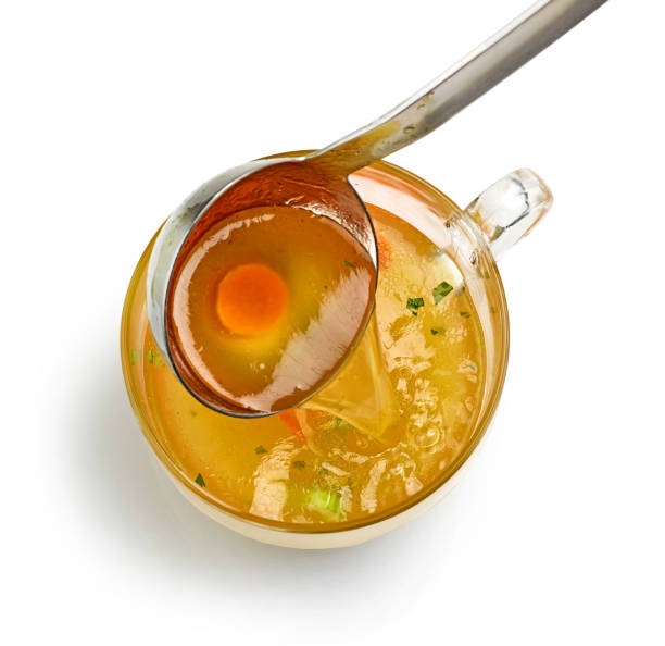 istock cup of fresh chicken broth 1395208712